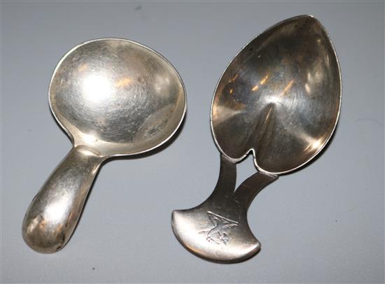 George III silver caddy spoon and another